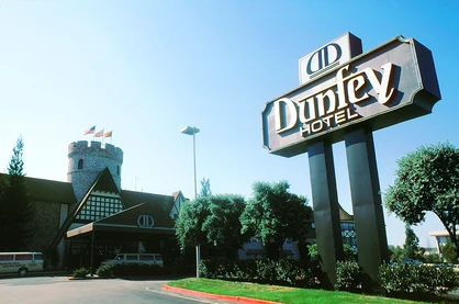 The Dunfey Hotel in San Mateo, photographed in 1985 — a low building in the style of a Tudor castle.